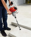 Kickass 25.4cc Gasoline Punch Drill And Concrete Breaker Kit With Two Sharp Tungsten Bits used on concrete slabs for fast chiseling.