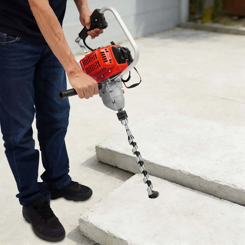Kickass 25.4cc Gasoline Punch Drill And Concrete Breaker Kit With Two Sharp Tungsten Bits used on concrete slabs for fast chiseling.