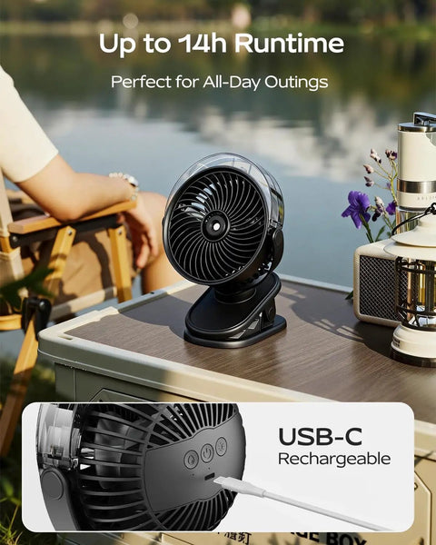Portable Misting Clip On Fan With USB C Rechargeable Battery on outdoor table, showing fan setup and USB-C charging connection.