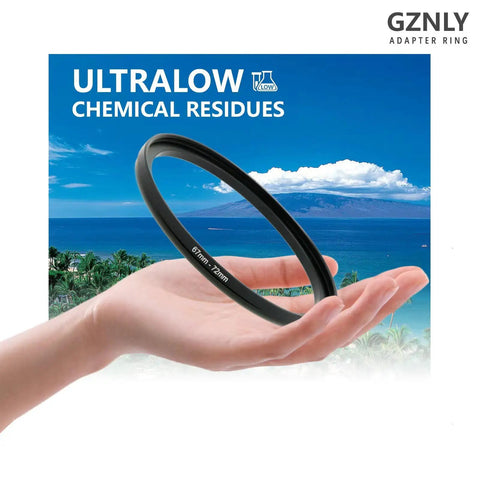 67mm To 77mm Step Up Filter Adapter Ring Built To Last Black Aviation Aluminum With Hand Holding Against Seascape Background