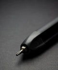 Close-up of 9 in 1 Precision Screwdriver Set for Knives and Gear Maintenance, featuring magnetic bit tip and slim pen style design.