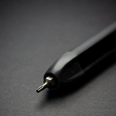 Close-up of 9 in 1 Precision Screwdriver Set for Knives and Gear Maintenance, featuring magnetic bit tip and slim pen style design.