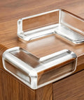 Clear PVC Furniture Corner Protectors, 4 Pack, Easy Install Edge Guards For Tables And Desks, Kid Safe Corner Guards on wood table