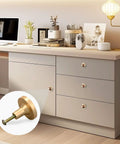 Four Pack Highland Cow Sunflower Gold Cabinet Knobs With Dual Screws on modern desk drawers, highlighting scratch-resistant finish.