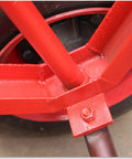 Two Wheel Concrete Pole Mover Cart For Heavy Duty Utility Poles Single Utility Pole Dolly With Beast Steel Construction For Linemen Field Work And Power Installation, red steel wheel frame close-up