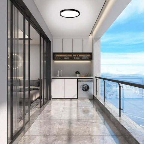 Black 9 Inch Flush Mount Ceiling Light Fixture, Low Profile Slim Surface Light, 18W 5000K Daylight in a modern balcony setting