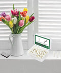 Handy Dandy Honey Do Hero Window Fix Kit With 50 Spring Loaded Shutter Pins And 80 Silver Tilt Rod Louvers Staples displayed beside flowers.