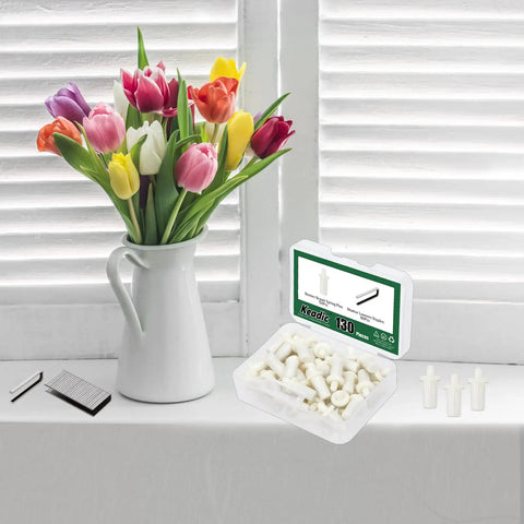 Handy Dandy Honey Do Hero Window Fix Kit With 50 Spring Loaded Shutter Pins And 80 Silver Tilt Rod Louvers Staples displayed beside flowers.