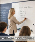 Teacher using Black Dry Erase Markers 12 Count Set With Low Odor Ink And Chisel Tip For Whiteboards in classroom.