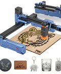 Artilume T1 laser engraver with blue frame and orange laser head engraving a tiger on a wood board.