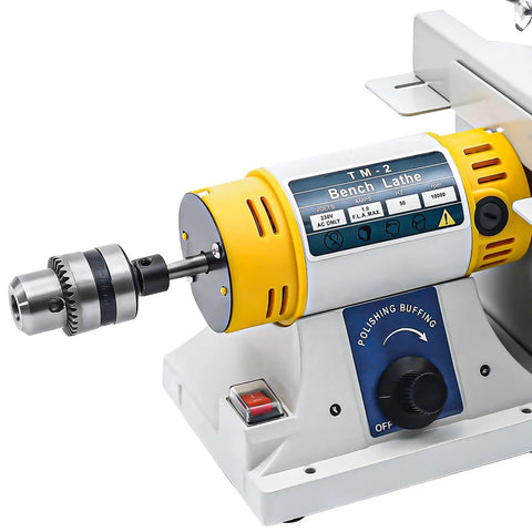 Close-up of Desktop Do It All Jewelry Grinder And Polisher 320W 110V Multi Function Buffer Tool Kit with yellow motor and drill attachment.