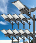 Heavy Duty Commercial Solar Street Light Featuring Badass 6500K Daylight LEDs, multiple units mounted on poles against a blue sky.
