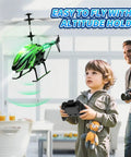 Kids RC Helicopter With 8 Light Modes And Easy Controls, 26 Minute Flight With Two Batteries, hovering indoors near child