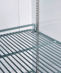Interior close-up of Heavy Duty One Door Reach In Freezer Boasting Hella Roomy Twenty Three Cubic Foot Capacity With Rock Solid Stainless Steel Construction And Smooth Rolling Casters shelf.