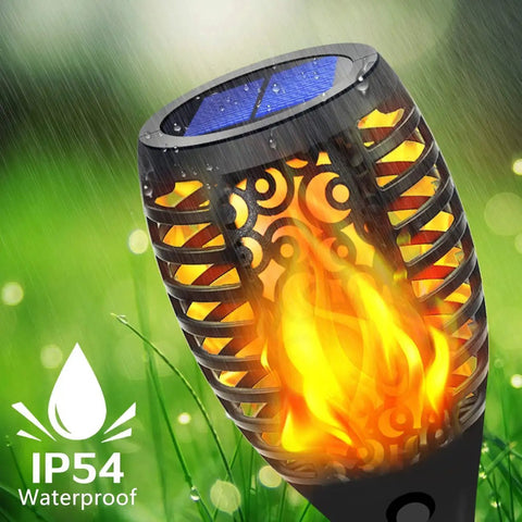 Outdoor Solar Tiki Torch Lights With Realistic Flickering Flame, showing waterproof design and solar panel in garden setting.