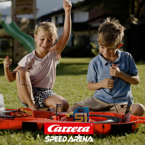 Kids playing with Speed Arena Disney Pixar Cars Slot Car Race Track Set With Lightning McQueen And Dinoco Cruz Ramirez outdoors.