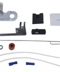 No Sweat Trolling Motor Conversion Kit components including brackets, servo parts, and assembly tools for Johnson Evinrude Suzuki engines.