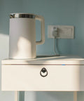 White cabinet with Vintage Cabinet Handles And Antique Drawer Pulls Set With Retro Alloy Door Knobs, next to an electric kettle.