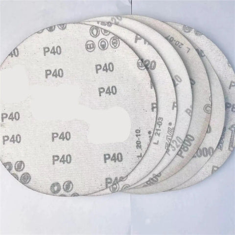 Ten Pack 8 Inch Sanding Discs Hook And Loop Adhesive Machine Paper Aluminum Oxide Grits 80 120 240 laid out on flat surface.