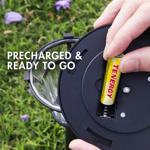 Inserting Solla NiMH AA rechargeable battery 1000mAh into solar garden light for seasonal outdoor durability.