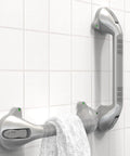 17 Inch Suction Grab Bar Set With Indicators No Drill Easy Install Two Pack For Shower Bathtub And Toilet Balance Boost Steady Handle Dual Tone Silver And Black installed on tile wall.