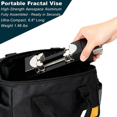 Hand placing a portable fractal vise into a black carrying bag, showcasing a 6.8-inch length compact tool.