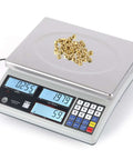 Heavy Duty Workhorse Industrial Counting Scale For Parts And Coins Digital Scale With 30kg/66lb Capacity And 1g Resolution G/Kg/Lb Unit Conversion Three Display Windows Quick Counting For Inventory Jewelry Nuts Bolts And Small Parts with nuts on the platform.