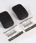 Mazda Miata 1990-2005 and Mazda 323 1986-1989 New OEM Clutch Pedal Pad Set shown in package with part number and rubber texture details.