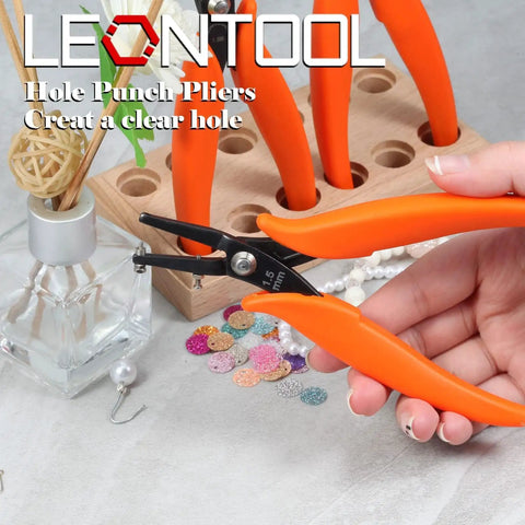 6 Inch Metal Hole Punch Pliers For 1.5mm Clean Holes In Jewelry Making with orange PVC grips, held next to beads.