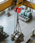 VEVOR Hand Chain Hoist, red, 1-ton capacity with galvanized chain, hanging from yellow crane beam in workshop