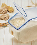 Heavy Duty Bulk Food Storage Containers With Smooth Rolling Wheels And Snap Tight Lids, 50 Cup dry food bin with rice inside.
