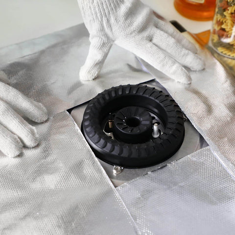 Hands demonstrating installation of 4 Sheets 12-Inch By 30-Inch Aluminized Heat Shield With Adhesive Backed Thermal Barrier Insulation Wrap.