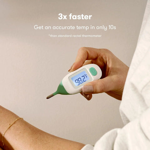 Close-up of a digital rectal thermometer showing 98.2°F from the All In One Baby Health Care On The Go Travel Kit With NoseFrida Snotsucker Rectal Thermometer MediFrida Medicine Dispenser And Portable Carrying Case Ideal Gift Set For Parents.