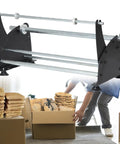 Heavy Duty Honeycomb Paper Dispenser And Packaging Feeder With Adjustable Tension And Stretching Device For Smooth Roll Action Straight Fire Performance For Fast Box Taping on a packing station.