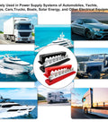 Heavy Duty 600A Battery Busbar 12 To 48V DC Power Distribution Block featuring nickel plated copper amidst vehicles and boats.