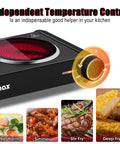 Close-up of Dual Infrared 1800W Hot Plate Portable Electric Stove With Glass Cooktop And Adjustable Temperature Control.