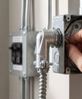 Heavy Duty Ninety Degree Squeeze Connectors For 3/4 In Flexible Metal Conduit And AC MC Cable Pack Of Ten, zinc elbow attached to junction box.