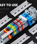 Industrial setup with 15 Pieces Slotted Aluminum DIN Rails, 4 Inch Long, 35mm Wide, 7.5mm High, colorful terminal blocks
