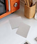 Mica Insulation Sheet 10 Pack For Microwave And Oven Repair Heat Resistant Fireproof Dielectric Board on kitchen counter.
