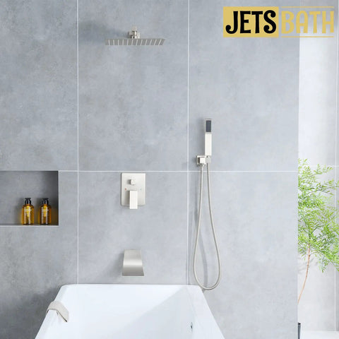 All-In-One Tub And Shower Faucet Set In Brushed Nickel With 12-Inch Rainfall Shower Head Waterfall Tub Spout And Rough-In Valve Complete Bath Trim Kit For An Easy, No-Brainer Upgrade installed above bathtub.