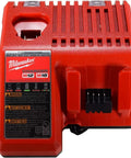 Kickass Brushless Cordless Two Piece Power Duo Combining 18 Volt Four Point Five Inch Grinder With Three Eighth Impact Wrench Paired With Two Tough Five Amp Batteries Made For Quick Fixes And All Day Job Site Grinds Milwaukee M12 M18 battery charger, durable red charger for quick battery charging.