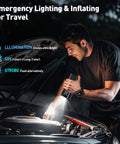 Man using Portable Car Tire Inflator And Air Compressor With Pressure Gauge And LED Light Auto Shut Off At Preset PSI near car engine at night