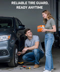 Man using Tire Inflator Portable Air Compressor For Cars Fast Inflation Electric Air Pump With Auto Shut Off And Digital Pressure Gauge