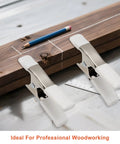 Beastly Grip Heavy Duty 4 Inch Spring Clamps securing a wooden plank with pencil and ruler on a workbench.