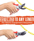 Hands using scissors to cut yellow plastic chain safety barrier 124 feet with 2 inch links lightweight UV protected.