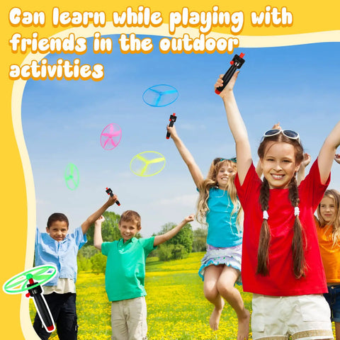 Kids playing with Disk Helicopter Toy Set With 12 String Launchers And 24 Flying Saucers For Outdoor Fun in a grassy field