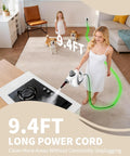 Young woman using the Grab This Bad Boy Of A Handheld Steam Cleaner For Home with 9.4ft cord, cleaning stovetop in a cozy living room.