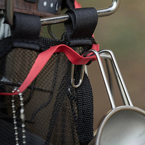 Close-up of Desktop Trash Can Holder And Hanging Rack Organizer for Home And Camping, showing metal hook and fabric straps.
