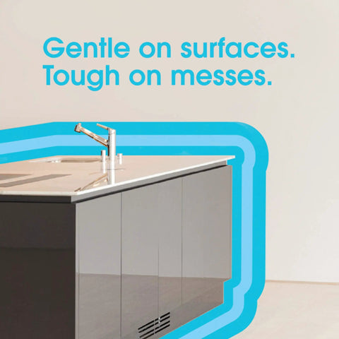 Modern kitchen countertop with text 'Gentle on surfaces. Tough on messes' showcasing Multi Surface Furniture Polish Wipes Clean And Protect Wood Granite And Leather With Fresh Citrus Scent pH Balanced Formula Pack Of 6 150 Total Wipes.
