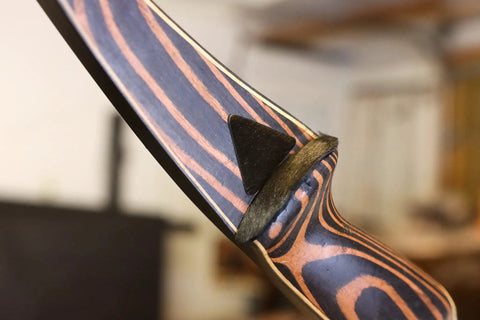 Calf Hair Arrow Rest for Recurve and Longbow Silent Mode with directional hair and peel-and-stick adhesive on wood bow.